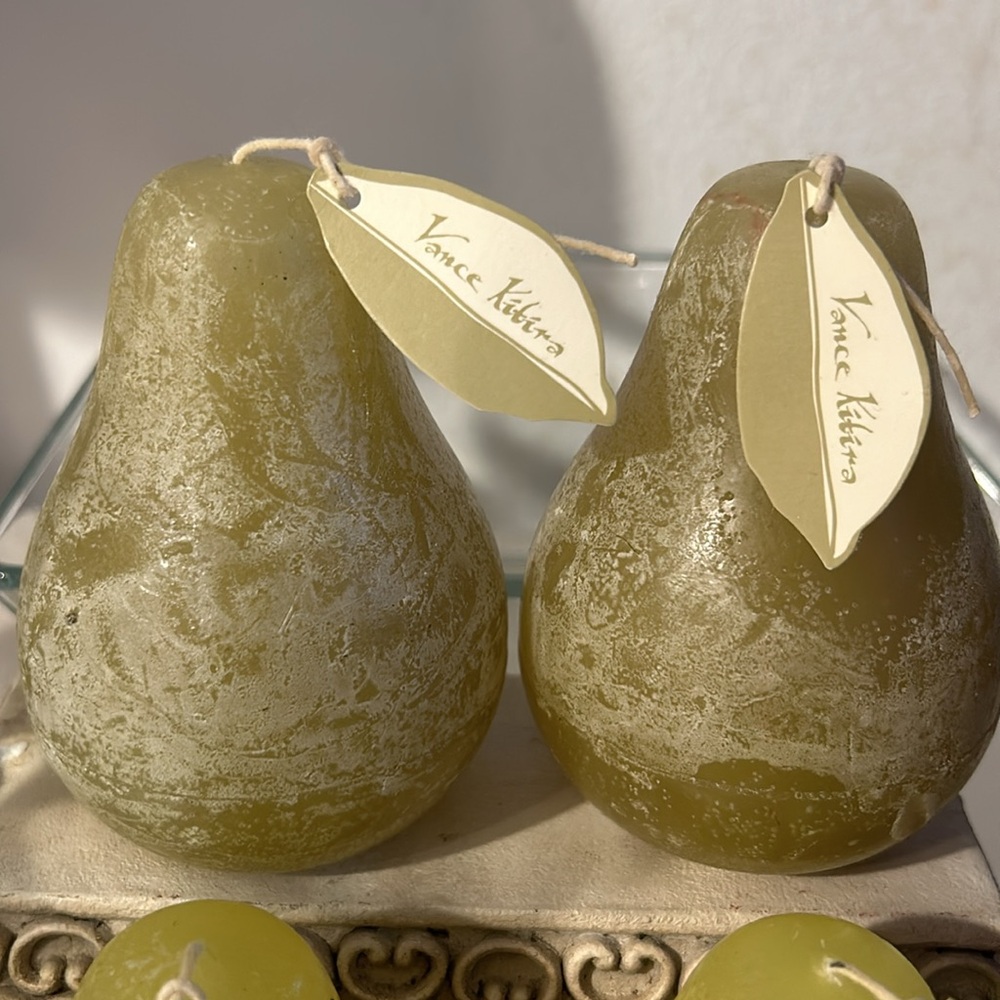 2 Vance Kitira, unscented pear shaped candles.
